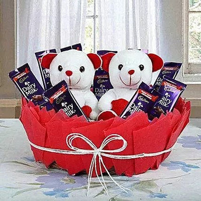 Couple teddy arrangements with chocolates