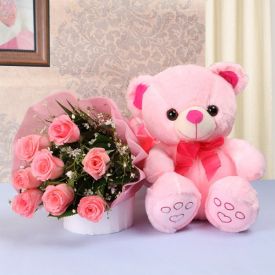 Pink roses with teddy bear