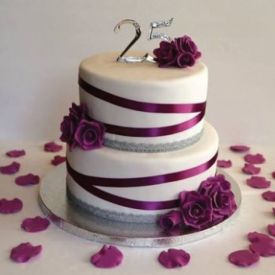 silver anniversary cake decorate with flowers
