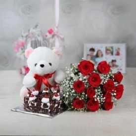 10 Red Roses, 1/2 Black Forest Cake and 6 inch Teddy bear