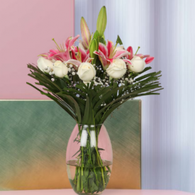 Pink lilies and white Rose with vase