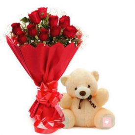 Red roses and cream teddy bear