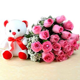 A basket of 20 pink roses and (6 inch) white teddy bear