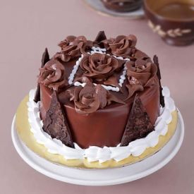 Half Kg Round Chocolate Cake with Chocolate Cream Flowers