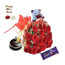 A bunch of 20 red roses,1/2 Kg chocolate Cake,6 inches Teddy bear and cadbury chocolate