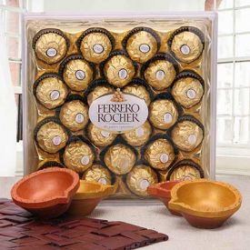 24 pieces of Ferrero Rocher and 4 diyas