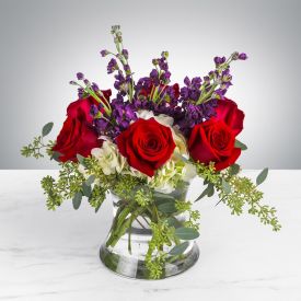 Roses and orchid in vase